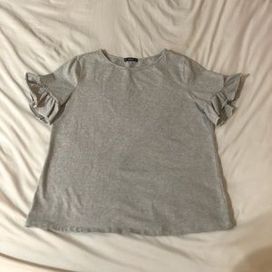 Grey and white striped tee.